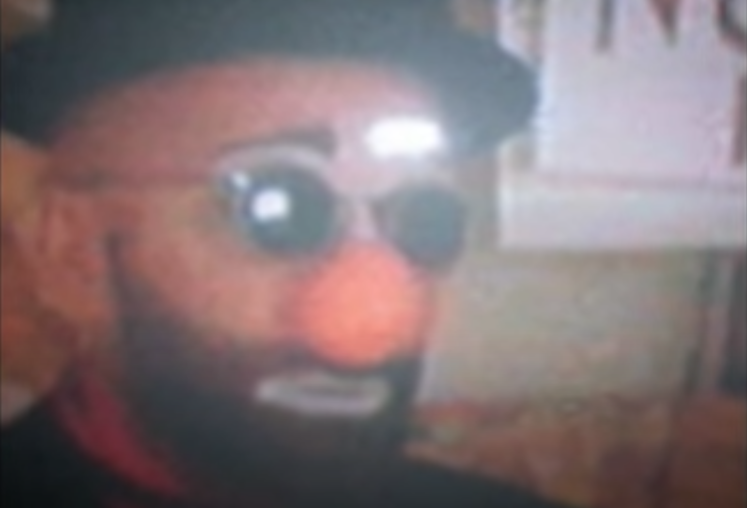 television with Crotchy the Clown up close